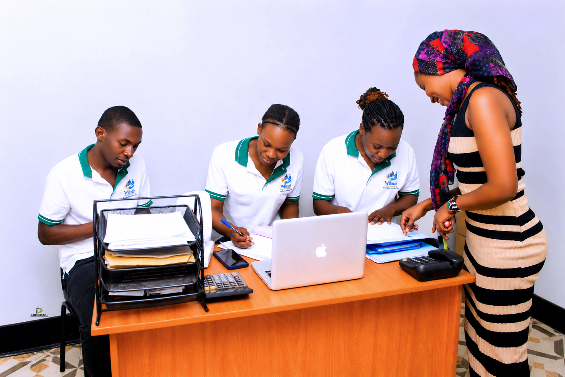 Willmaha staff serving a client at the office